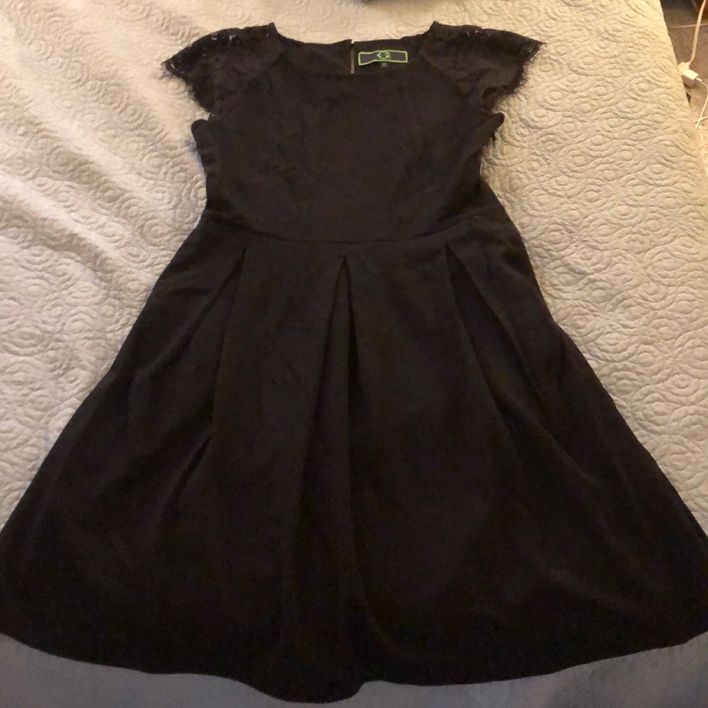 Black pleated a-line dress
